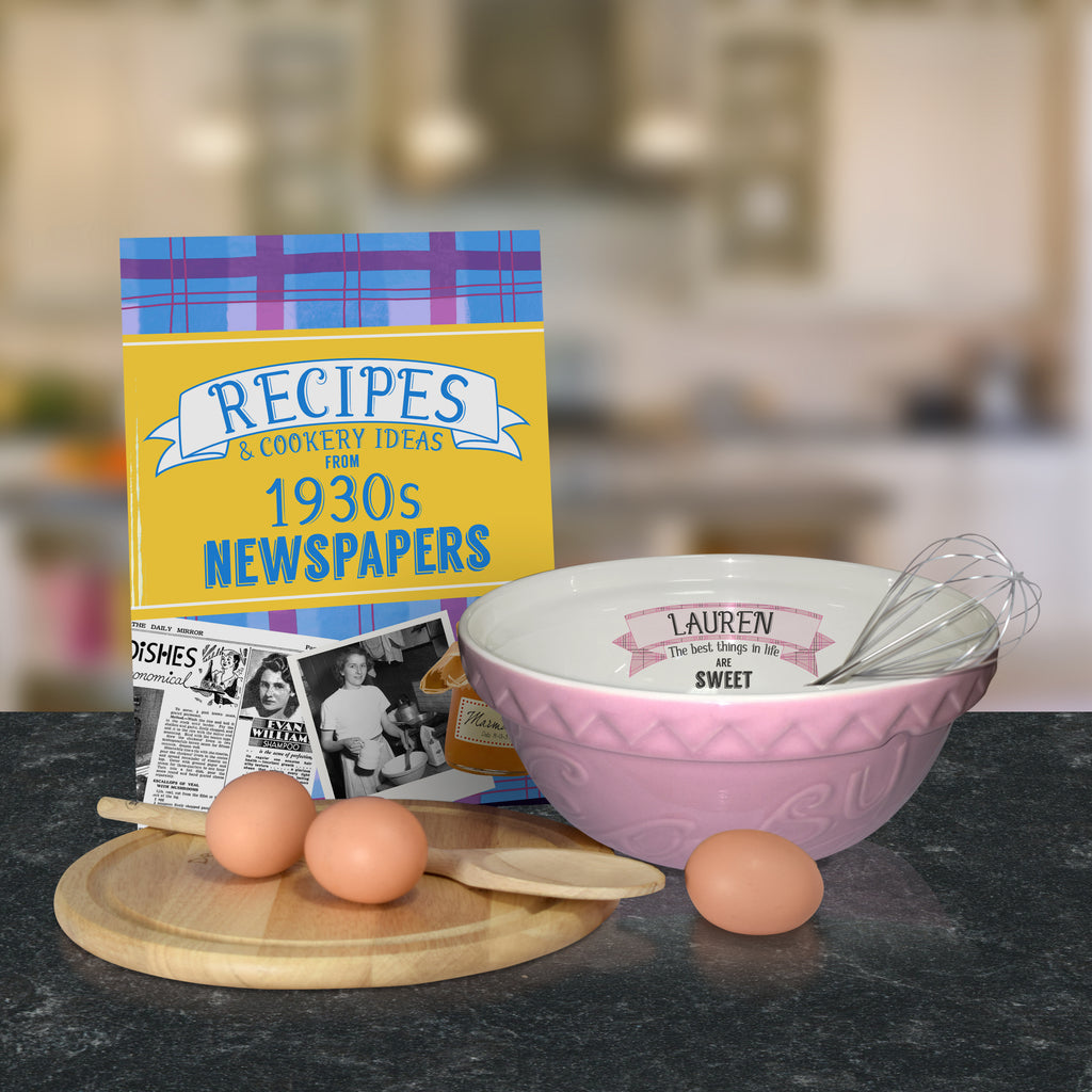 Pink mixing bowl and 1930 recipe book