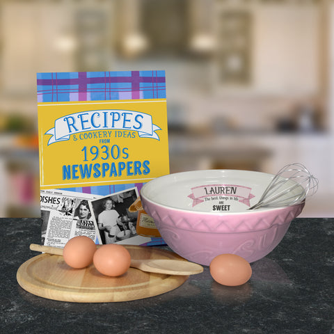 Pink mixing bowl and 1930 recipe book
