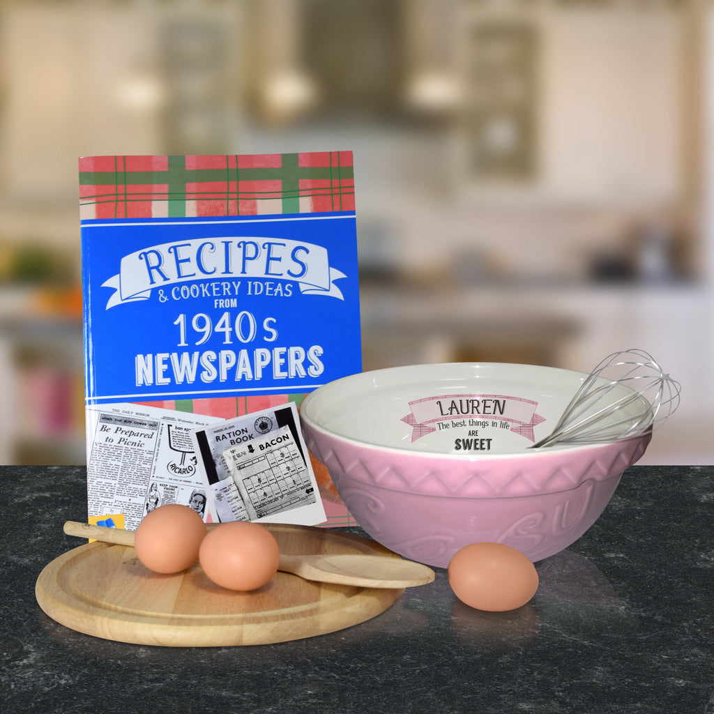 Pink mixing bowl and 1940 recipe book