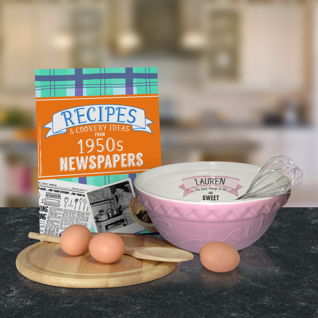 Pink mixing bowl and 1950 recipe book