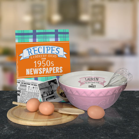 Pink mixing bowl and 1950 recipe book