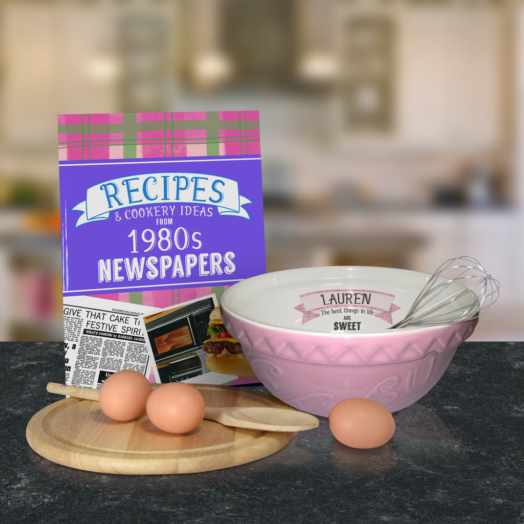 Pink mixing bowl and 1980 recipe book