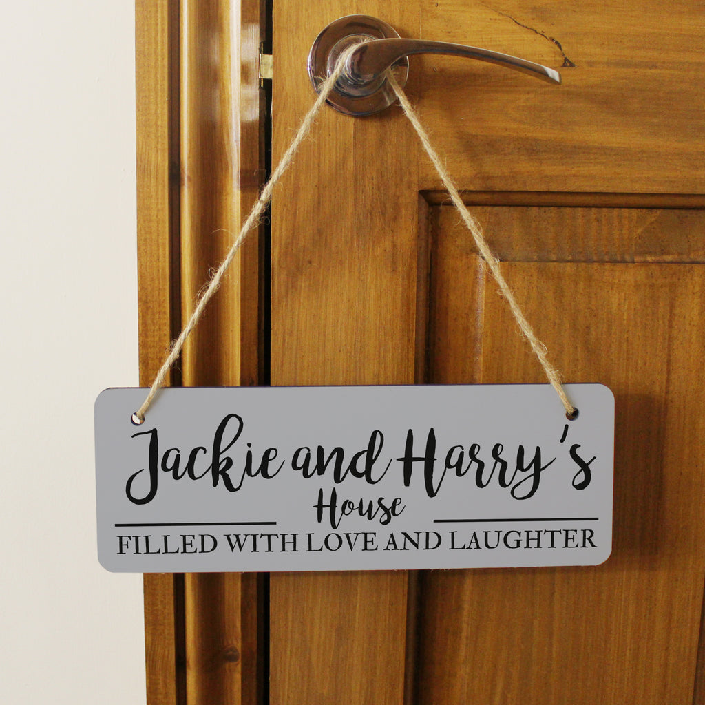 Filled with love and laughter house sign